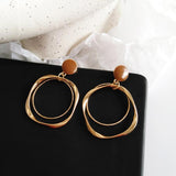 Aes Earrings