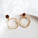 Aes Earrings