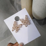 Assada Earrings